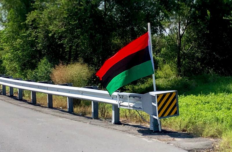 Flags flying high on Route 1 overpasses Cape Gazette